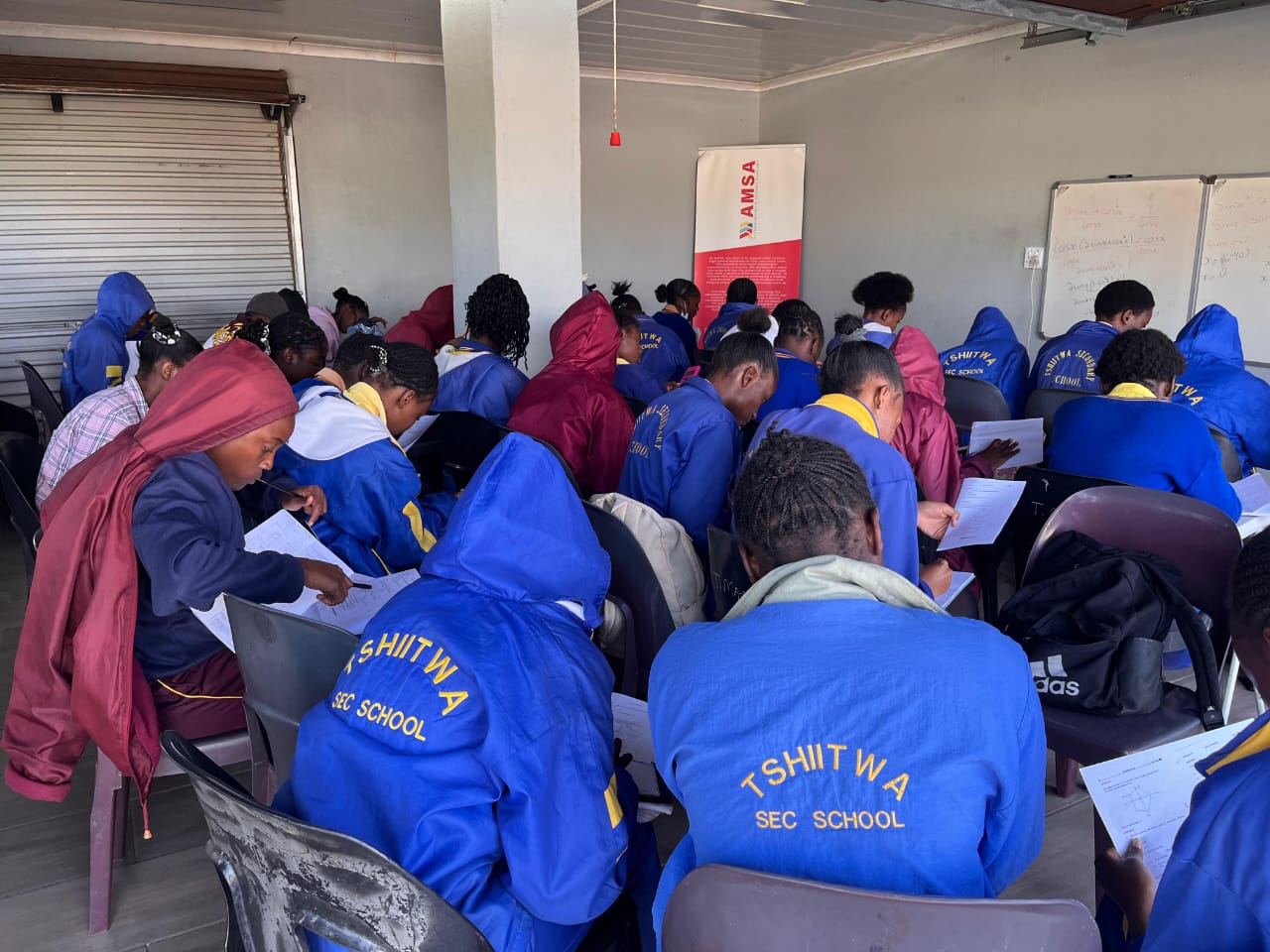 Students learning at Alusani Academy